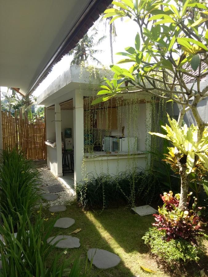 Andy Guesthouse Canggu Екстериор снимка